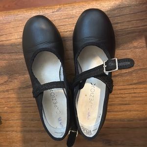 Tap shoes. Velcro closure. Great condition. Just grew too fast.